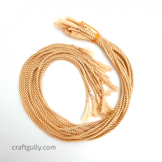 Rakhi Threads With Tassels - Cream - 12 Threads