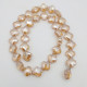 Glass Beads 10mm Clover Faceted - Champagne With Lustre - 1 String / 35 beads